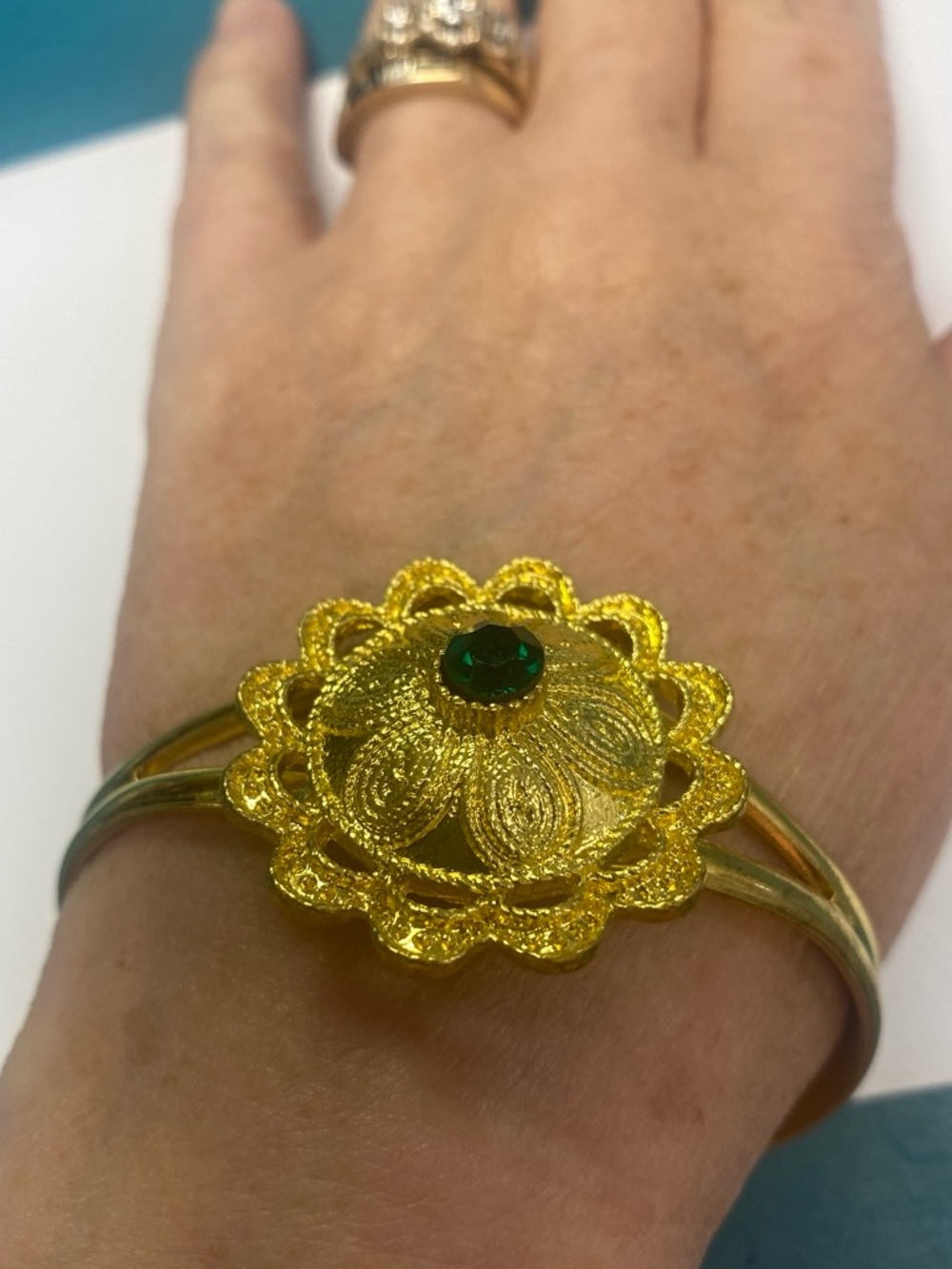 Gold-Tone Floral Cuff Bracelet with Green Stone
